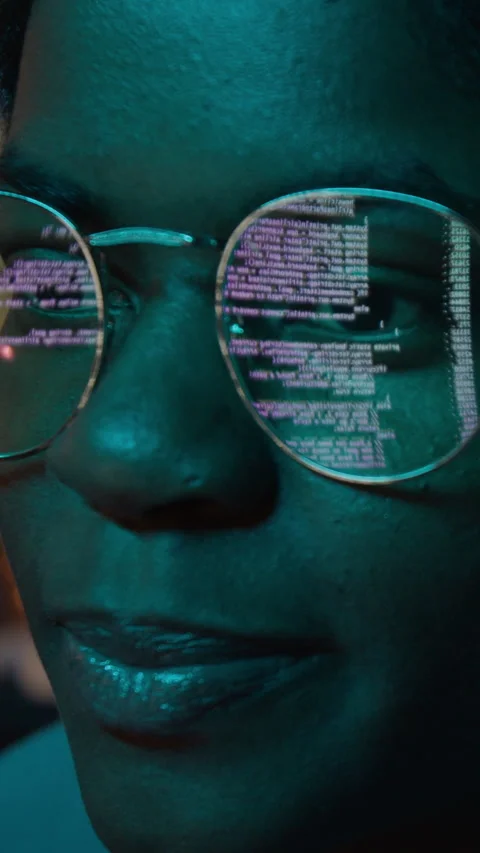 Vertical of Black Software Developer Coding with Code Reflection in Glasses Stock Footage 336708449