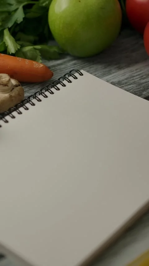 Vertical of Blank notebook near cooking ingredients Stock Footage 276918138