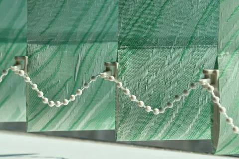 Vertical blinds on the window Stock Photos