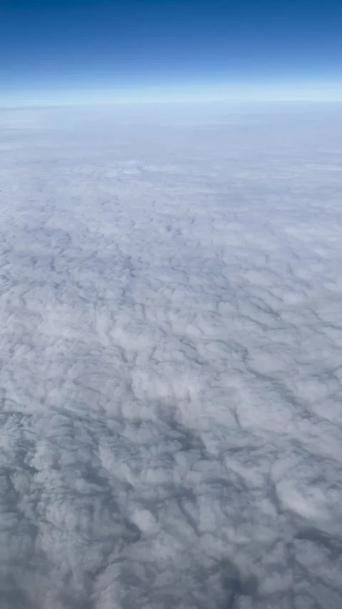 Vertical Blue Sky and Cloud View from airplane Stock Footage 306677517