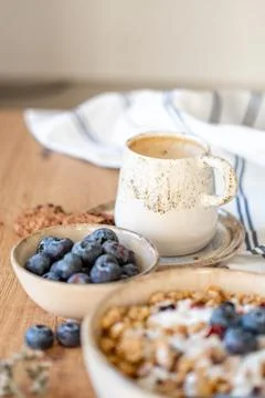 Vertical breakfast concept background, A bowl of cereal with blueberries and Stock Photos
