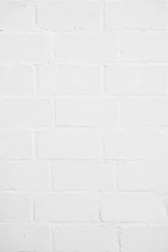 Vertical brick wall background painted white Stock Photos