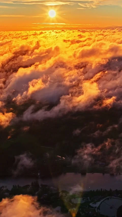 Vertical bright orange sunset above clouds Stock Footage 336754866