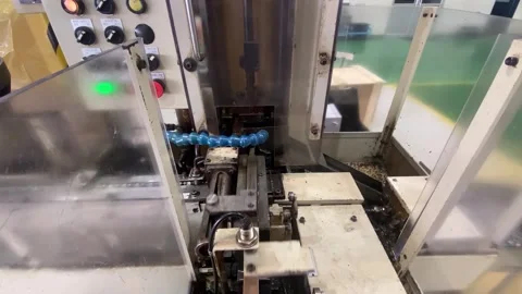 Vertical Broaching Machine Machining Metal Components in Manufacturing Plant Stock Footage 338069145