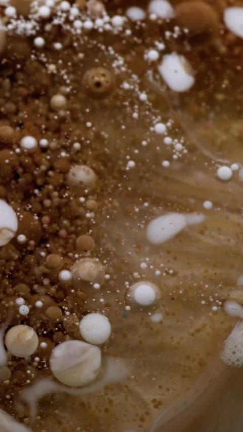 Vertical bubble spill paint mix oil color drops Stock Footage 315544623
