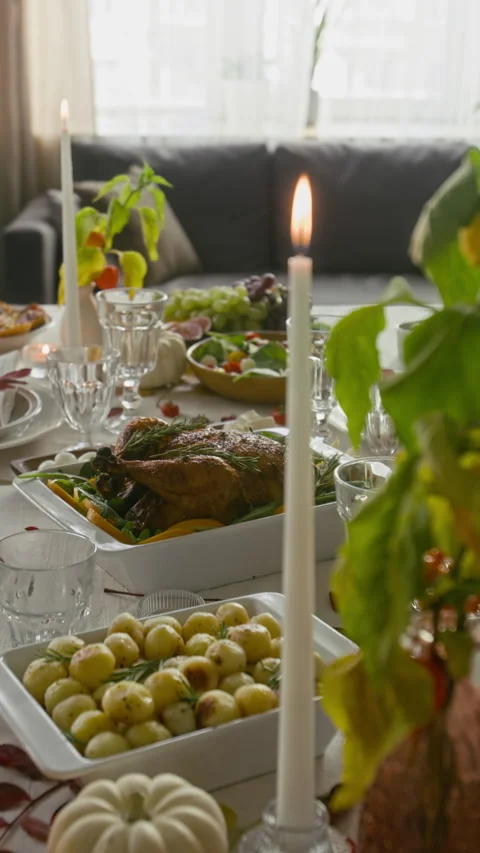 Vertical of Burning Candle on Festive Elegant Table Set for Fall Dinner Party Stock Footage 318008557