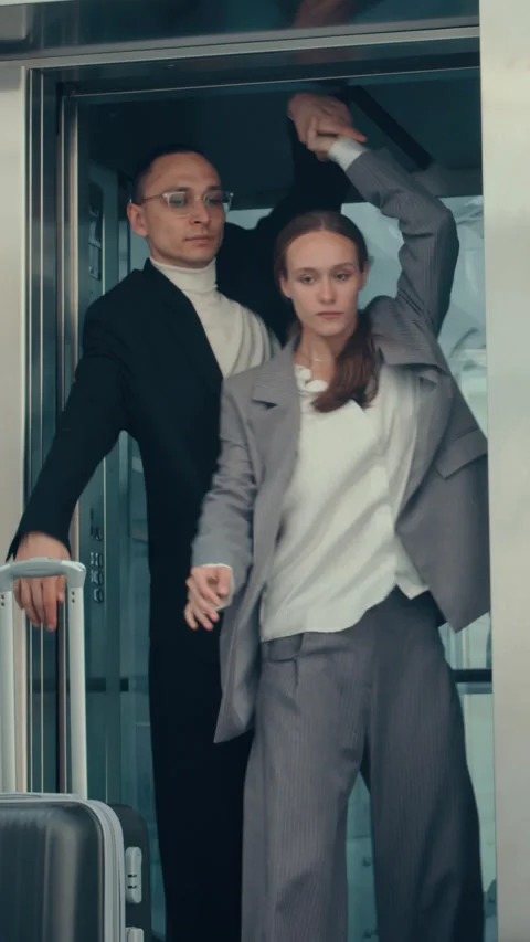 Vertical of Business Couple Dancing in Elevator Stock Footage 287158481