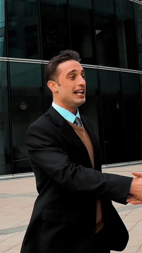 Vertical of Businessman shaking hands Stock Footage 305495490
