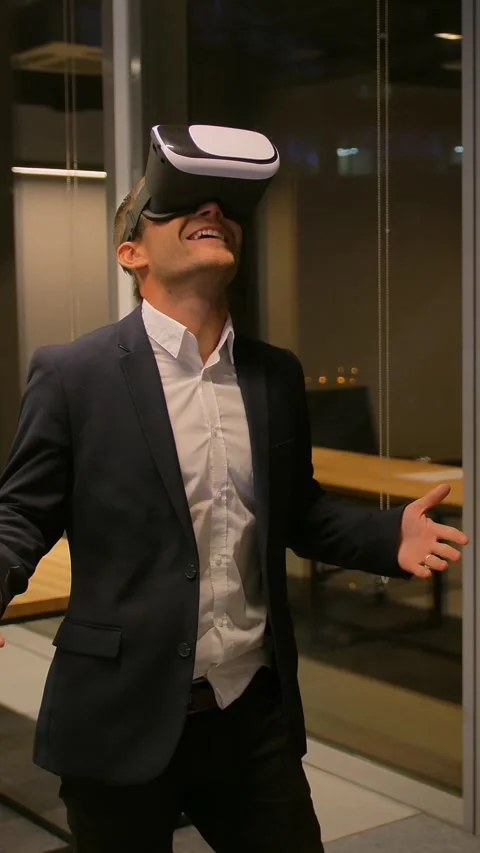 Vertical of Businessman using 3d glasses for virtual excursion or tour in Stock Footage 277283177
