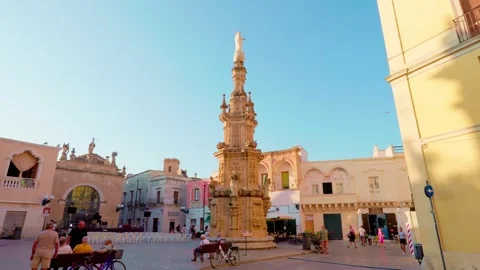 Vertical camera rise on the baroque spire in Piazza Salandra, Nardò Stock Footage 315936497