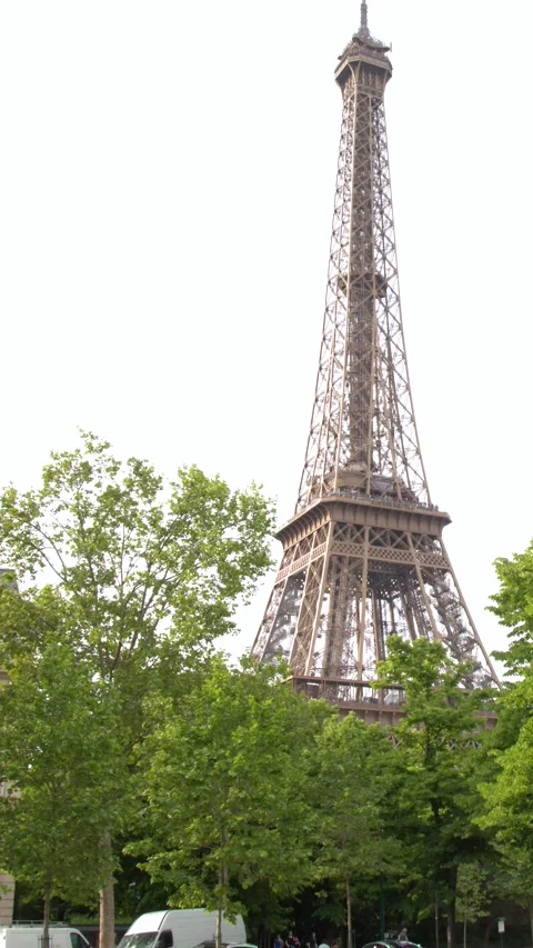 Vertical Camera Tilt Up the Iconic Eiffel Tower in Paris France Stock Footage 334360816