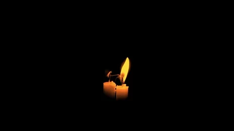 Vertical candle burns on a green background. Stock Footage 297595060