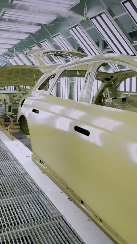 Vertical Car Body Moving Through Bright Inspection Tunnel in Automotive Plan Stock-Footage 332961021