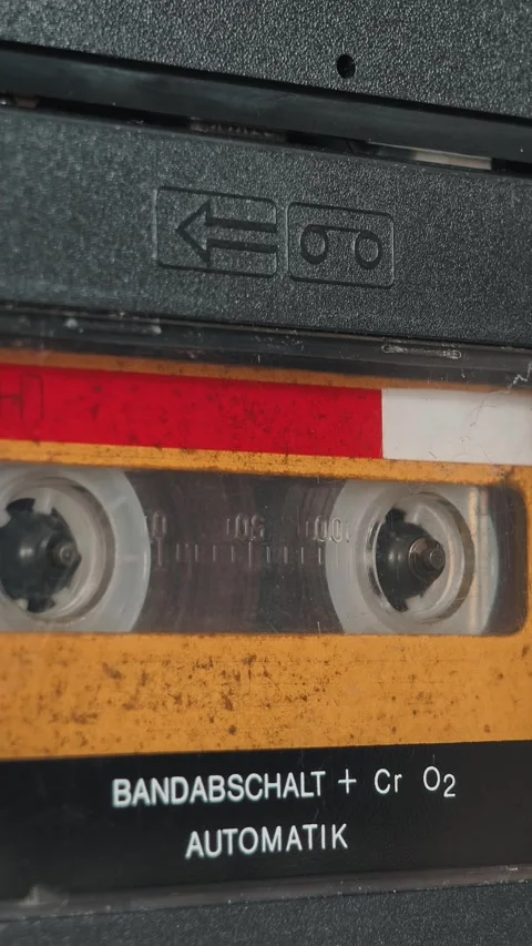 Vertical Cassette in Deck with Embossed Symbols Stock Footage 317762650