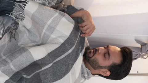 Vertical catch cold sick man home recovery Stock Footage 231053353