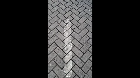 Vertical Centered Shot of Concrete Paving Block Pathway Stock Footage 336437707