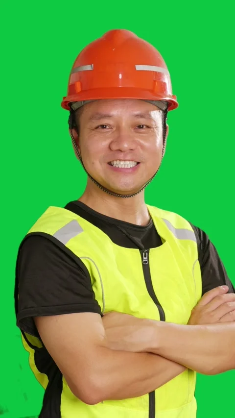 Vertical Chinese construction worker with red safety hard hat smiles Stock Footage 343606621