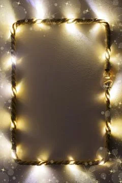 Vertical Christmas background with string lights Stock Photos