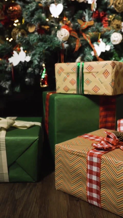 Vertical of Christmas tree with beautiful gift boxes. Stock Footage 305465048