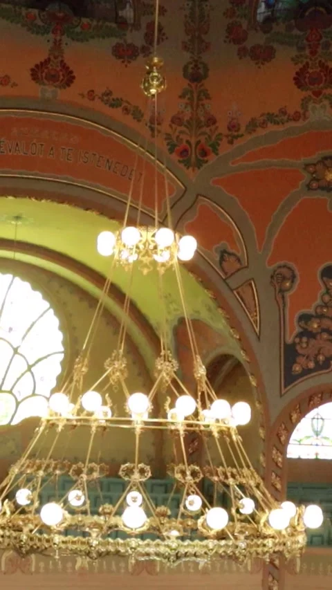 Vertical Cinematic Close-Up of Glowing Synagogue Chandelier Stock-Footage 331135829