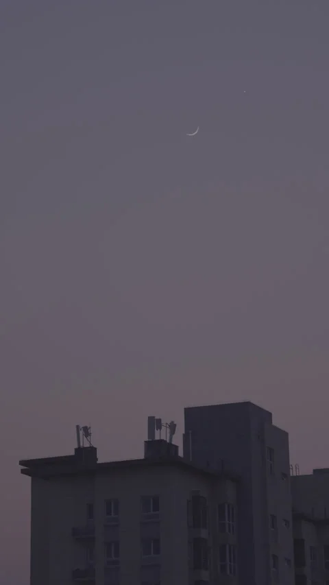 Vertical Cinematic Crescent Moon Over Skyscraper, Minimalist Night Sky Video stock 327183806