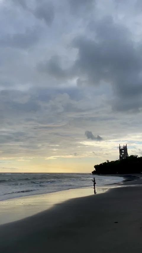Vertical Cinematic Golden Sunset Beach with Silhouette in Bali Stock Footage 337270087