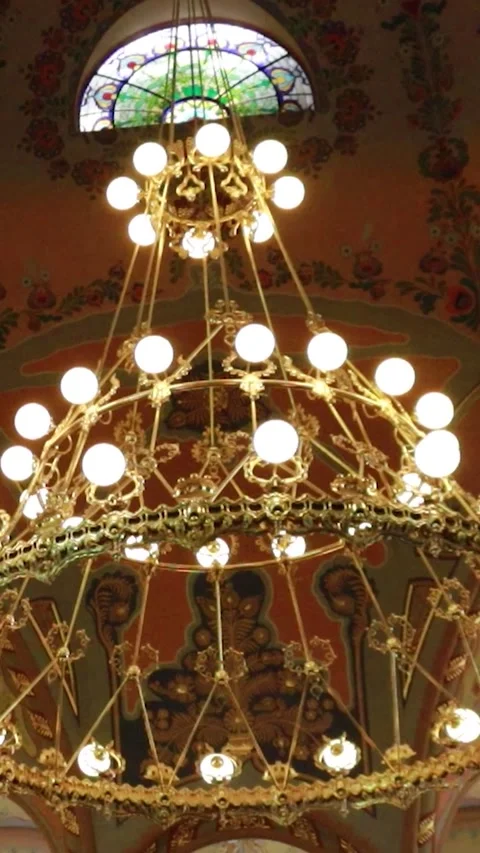Vertical Cinematic Low Angle Shot of Ornate Chandelier and Painted Dome Stock Footage 331135731