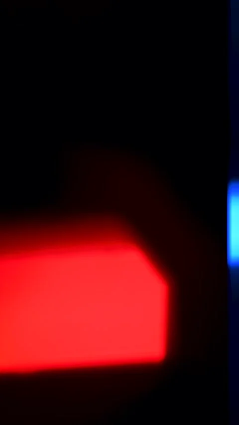 Vertical Cinematic Red and Blue Flashing Light Leaks Background Stock Footage 325454144