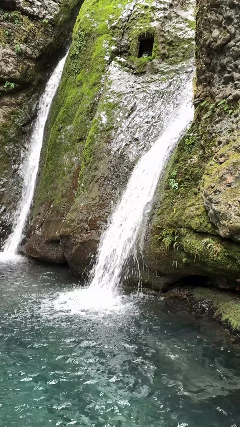 Vertical Cinematic Twin Falls into Emerald Pool 120fps Video stock 330622962