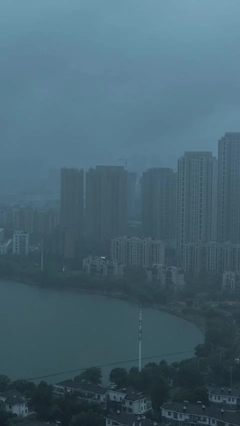 Vertical City Rain Storm Clouds Urban Landscape Motion Timelapse Stock Footage 327674464