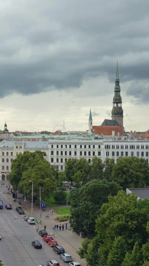 Vertical cityscape view of Riga Old Town with St. Peter Church spire, street Stock Footage 341851736