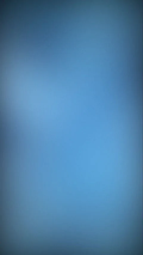 Vertical clean minimal blue bokeh transition with dark moody frame and smooth Stock Footage 336952818