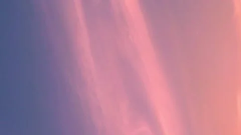 Vertical. Clear Pink Orange Blue Sky at Sunset and Light Cirrus Clouds. Colorful Stock Footage 256966468