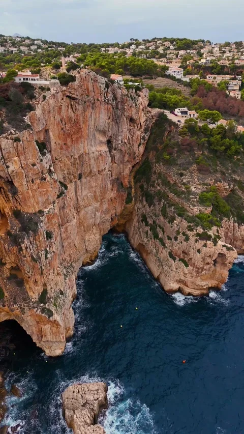 Vertical Cliff Aerial at Cabo de la Nao Javea Costa Blanca 動画素材 337436645
