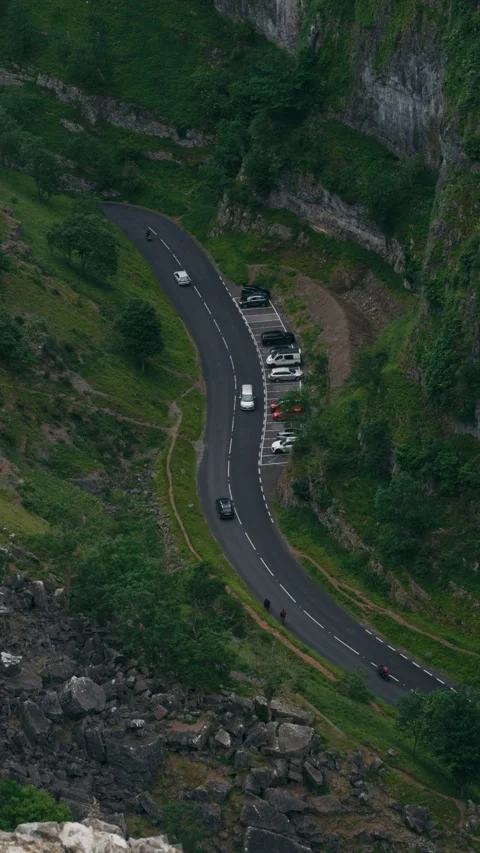 Vertical Cliff View Over Cheddar Gorge Road with Cars and Parking Stock-Footage 337718979