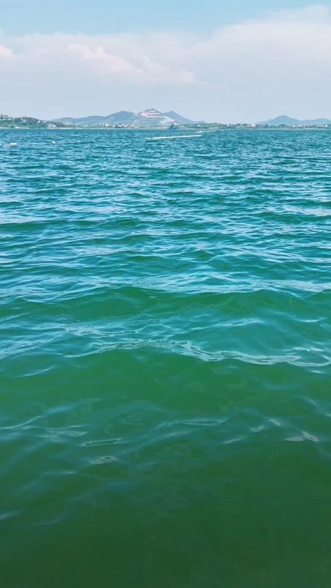 Vertical Clip of Blue Sky and Lake Stock-Footage 340305369