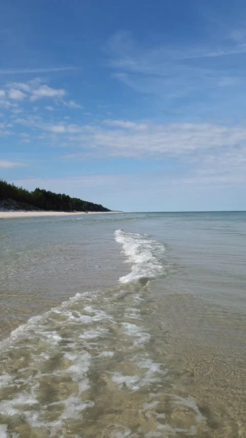Vertical clip of calm waves on the beach Stock Footage 171421009