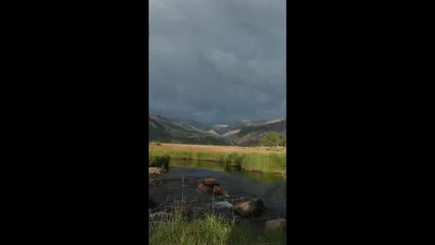 Vertical clip of mountain stream in slow motion Stock Footage 285090225