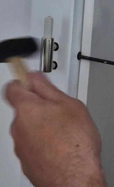 Vertical Close Up of Adjusting Door Hinge Stock-Footage 335709618