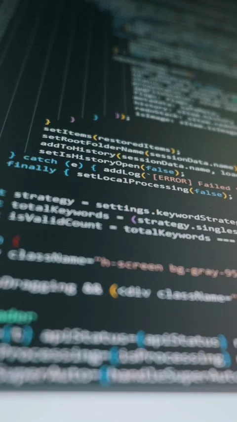Vertical Close Up Of AI Generated Code Scrolling On Dark Monitor Stock Footage 329909316