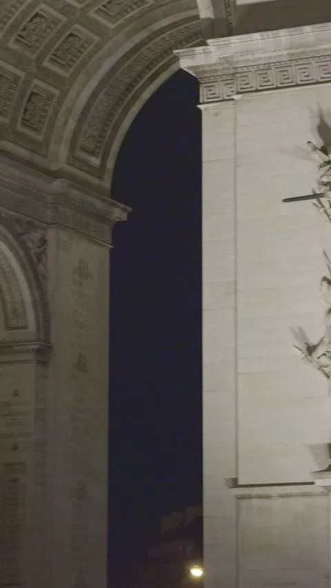 Vertical close up of the Arc de Triomphe at night in Paris, France Stock Footage 328962834