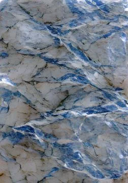Vertical close-up blue-colored marble stone pattern great match for background a Stock Photos
