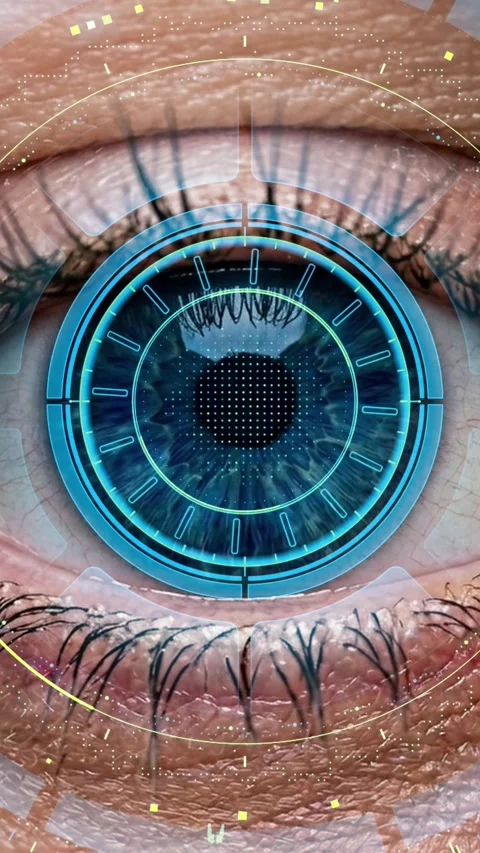 Vertical close up of blue eye with glowing cyan radar HUD overlay Stock Footage 337606957