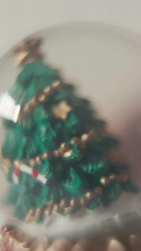 Vertical Close-up of Christmas Tree Snow Globe with Falling Snow Stock Footage 330927053