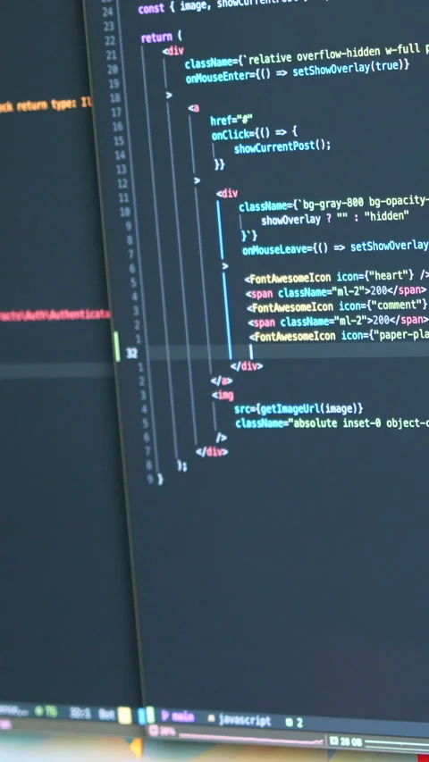 Vertical Close-up of Coding on Dual Screens Stock Footage 314686664