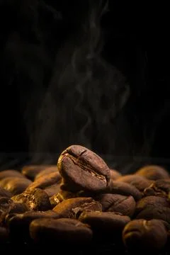 Vertical Close-Up of Coffee Bean with Rising Steam Stock Photos