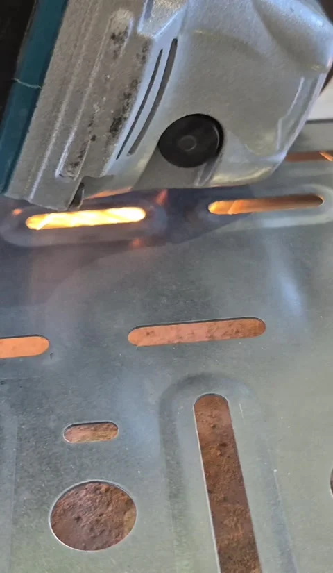 Vertical - Close-up of cutting metal cable tray with grinder Stock Footage 343755755