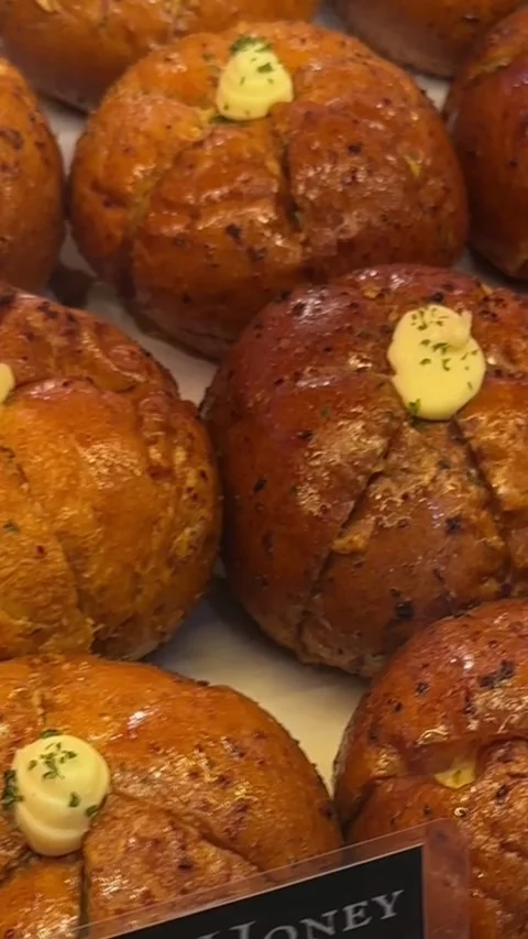 Vertical close up of garlic honey crispy bun Stock Footage 316813114