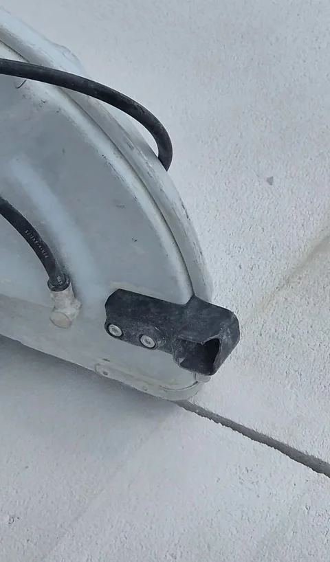 Vertical close up of handheld power cutter cutting concrete Stock Footage 340276029