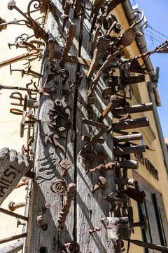 Vertical Close Up of Historical Guild Log with Handcrafted Iron Nails Stock Photos